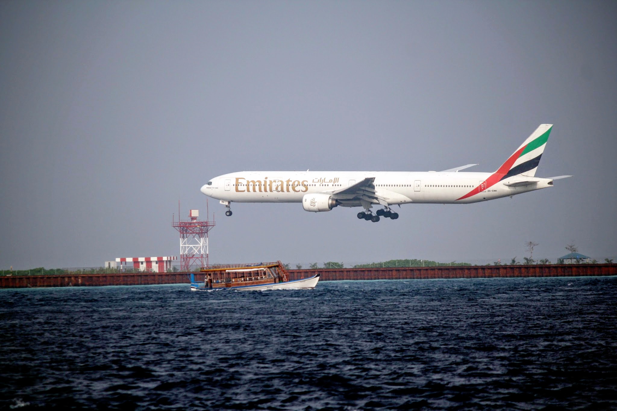 Emirates flight landing at Ibrahim Nasir International Airport